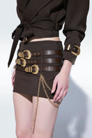 Brown mini skirt with belts from Zeynep Tosun, featuring a fitted design and stylish details, perfect for casual or chic outfits.
