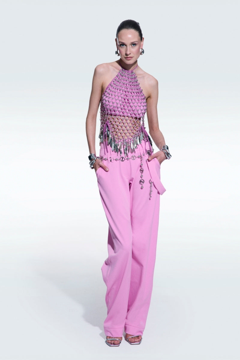 Pink high waist pants by Zeynep Tosun, stylish and tailored with a sleek fit, shown on a model.