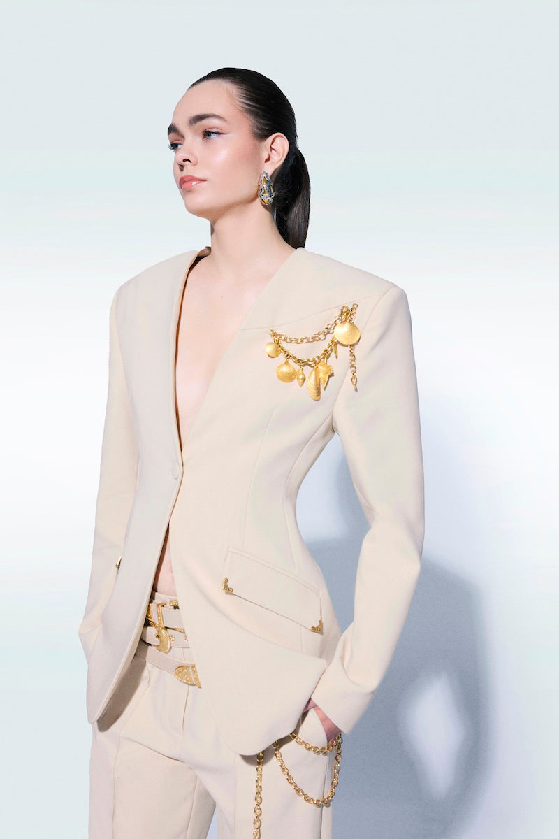 Beige pants with matching belt by Zeynep Tosun, featuring a tailored fit and stylish design.