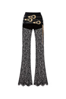 Black lace pants with belts by Zeynep Tosun, featuring intricate lace details and stylish belt accents in a front view.