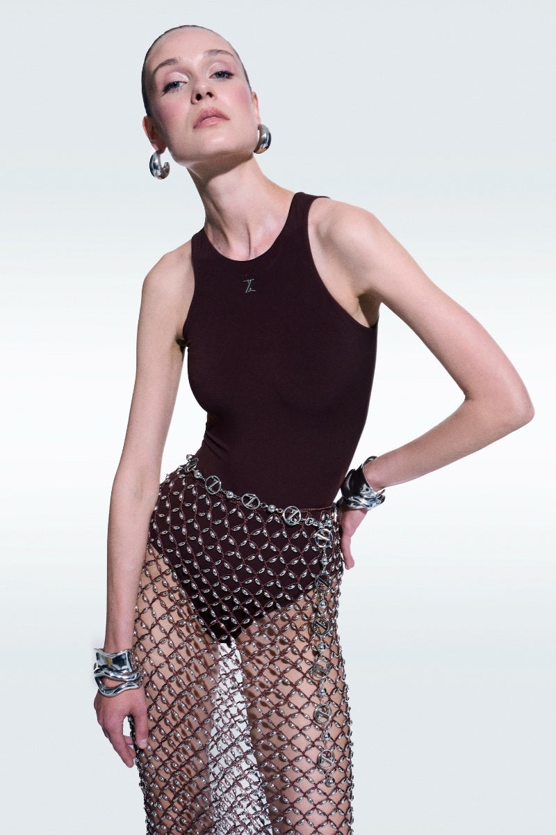 Brown jersey bodysuit by Zeynep Tosun, featuring a fitted design and long sleeves, perfect for stylish tops and layering.