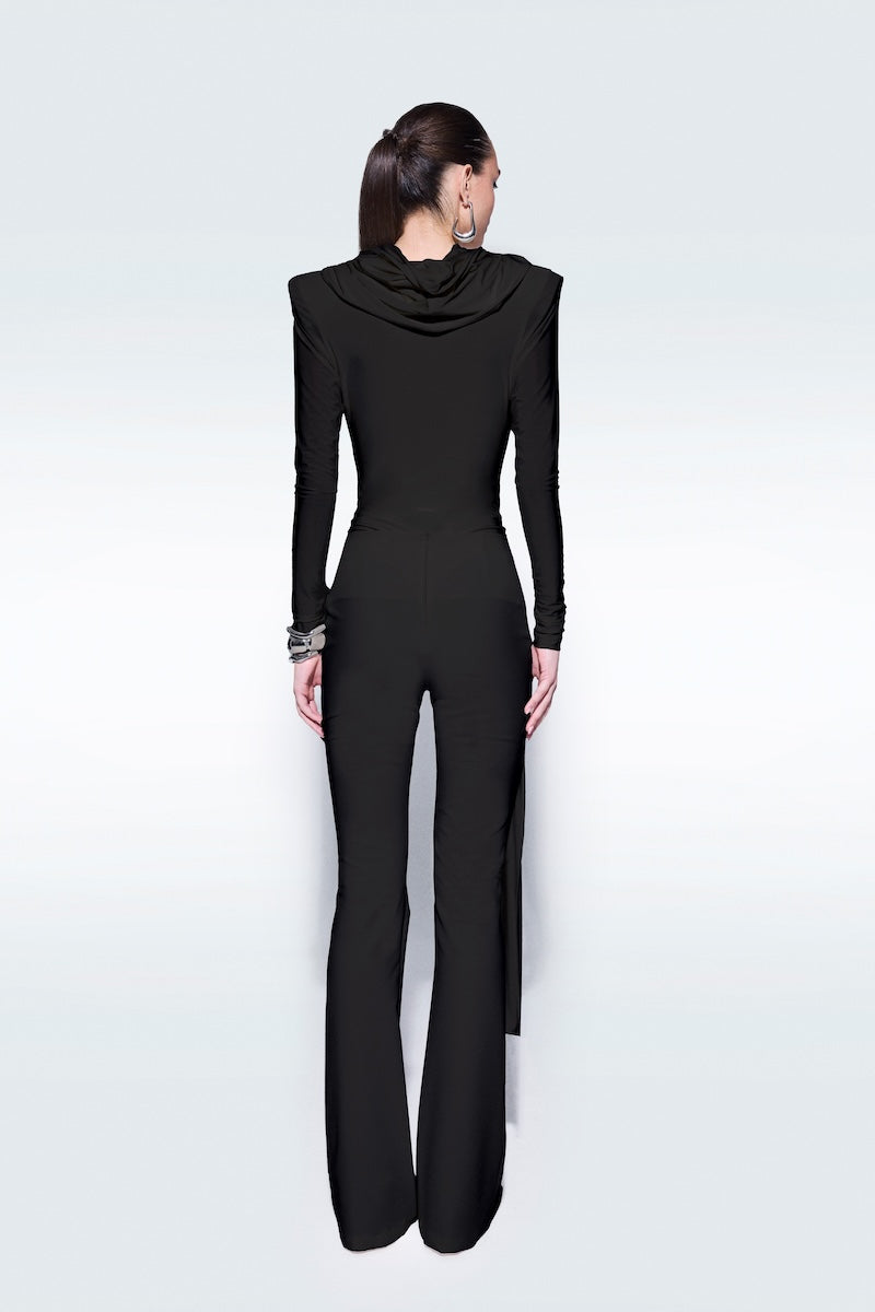 Black draped top by Zeynep Tosun featuring elegant fabric folds and a sophisticated design.