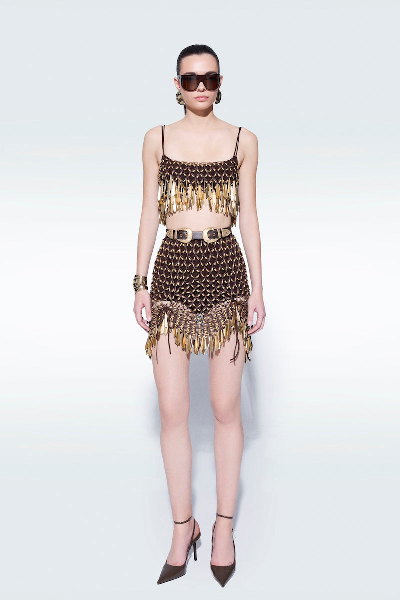 Brown leather belt by Zeynep Tosun with a sleek buckle, shown on a neutral background.