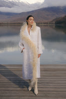 Lalo oversized beige coat with faux feather trim, stylish winter outerwear for a cozy, elegant look.