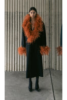 Lalo structured longline coat with multicolor pattern and side flap pockets, stylish and warm outerwear for cold weather.