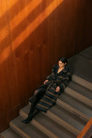 Multicolor Lalo coat with structured design and embroidered mesh detailing, showcasing a fashionable and textured outerwear piece.