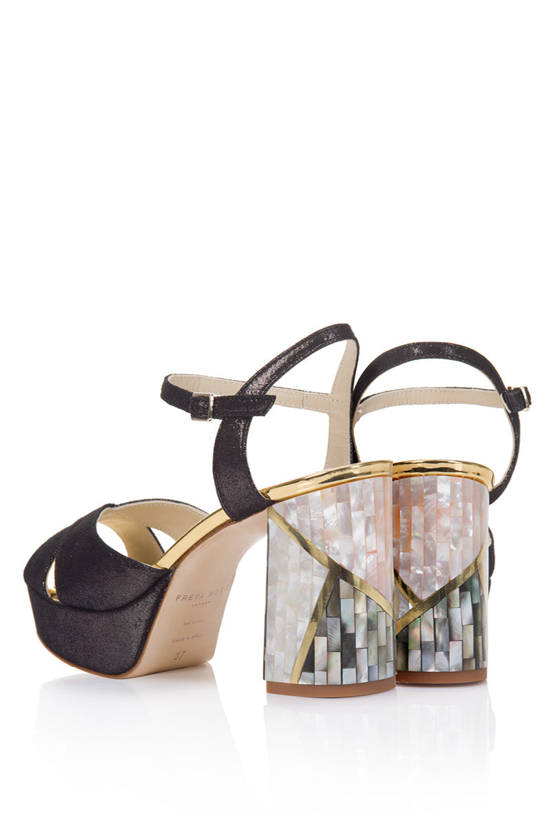 Black Zahra Noir heels by Freya Rose with sleek pointed toes and elegant stiletto heels, showcased on a neutral background.