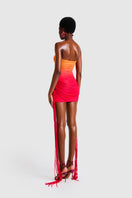 Zaya Tassel Mini Dress in Sunset Ombre by BBXBRAND, showing a stylish short dress with tassel details and vibrant sunset colors.