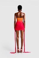 BBXBRAND ZAYA TASSEL MINI in Sunset Ombre, a stylish mini dress with tassel details in vibrant sunset gradient colors.