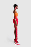 BBXBRAND ZAYA Tassel Mini Dress in Sunset Ombre with tassel details and vibrant gradient colors, perfect for summer outings.