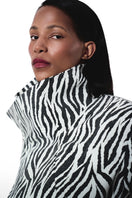 Kris Marán high neck zebra bomber jacket with matching gloves, stylish black and white animal print outerwear for women.