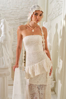 Nana Gotti Zephyra midi dress in lightweight fabric, featuring a flowy silhouette and stylish design, shown on a model.