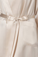 NK IMODE Zero Waste Robe in champagne color, soft fabric, stylish design, displayed on a hanger against a neutral background.