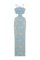 Nana Gotti Zeyna maxi dress in flowing fabric with a fitted waist and elegant design, perfect for summer or special occasions.