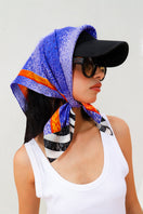 Amel Batita Zoo Moussard small silk scarf featuring a vibrant animal print, perfect for stylish neck or head wear.