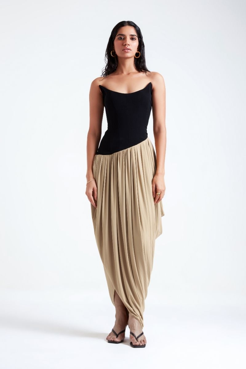 Black and beige Zosia maxi dress by Deme By Gabriella, flowing fabric, elegant design, shown on a model.