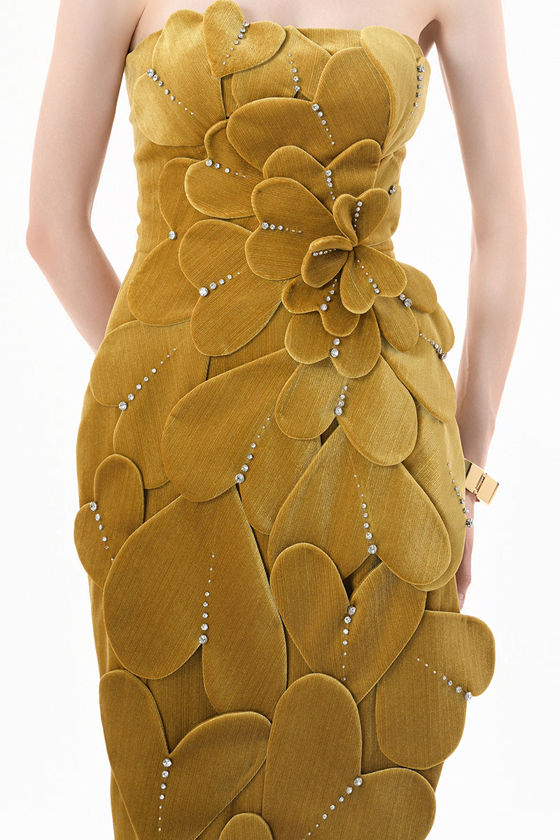 Elegant chartreuse gold velvet strapless gown with 3D petal details from Happy Clothing, showcased on a dress form.