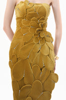 Elegant chartreuse gold velvet strapless gown with 3D petal details from Happy Clothing, showcased on a dress form.