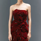 HAPPY CLOTHING CULT MIA X strapless burgundy velvet gown featuring a fitted bodice and flowing skirt.