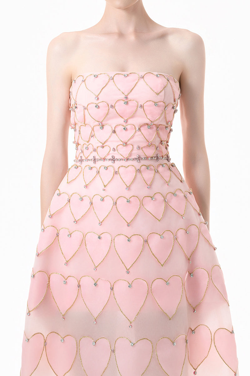 Blush pink embellished gown with heart motif from Happy Clothing, featuring intricate details and elegant fabric.
