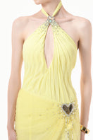 Yellow ruched halter plunge gown by Happy Clothing featuring a fitted design and elegant drape, perfect for formal occasions.