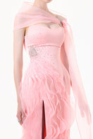 Blush pink draped ruffle gown by Happy Clothing featuring flowing fabric and elegant ruffle details.