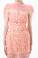 Peach beaded sheer overlay gown by Happy Clothing featuring intricate beadwork and flowing fabric.