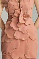 Pink velvet strapless gown with V-neck and petal details by HAPPY CLOTHING, showcasing a sleek, elegant design.