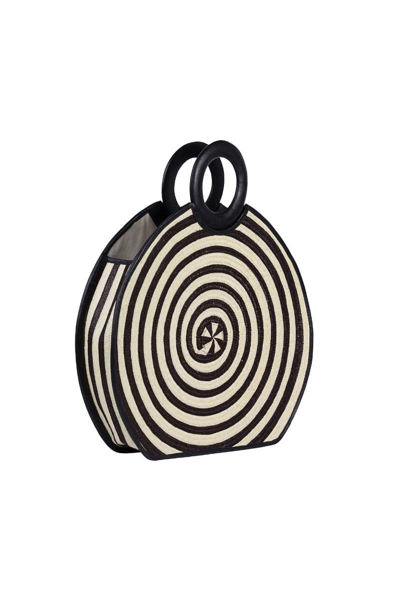 Black Zenú large leather and Caña Flecha top handle bag by Adriana Castro, featuring a stylish leather and woven design.