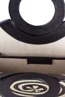 Black Zenú large leather and caña flecha bag by Adriana Castro, featuring a top handle and woven design.