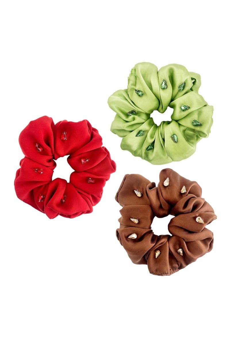 Aethera Amara silk scrunchie set with rhinestone embellishments in crimson, pistachio, and brown colors, showcasing luxurious hair accessories.