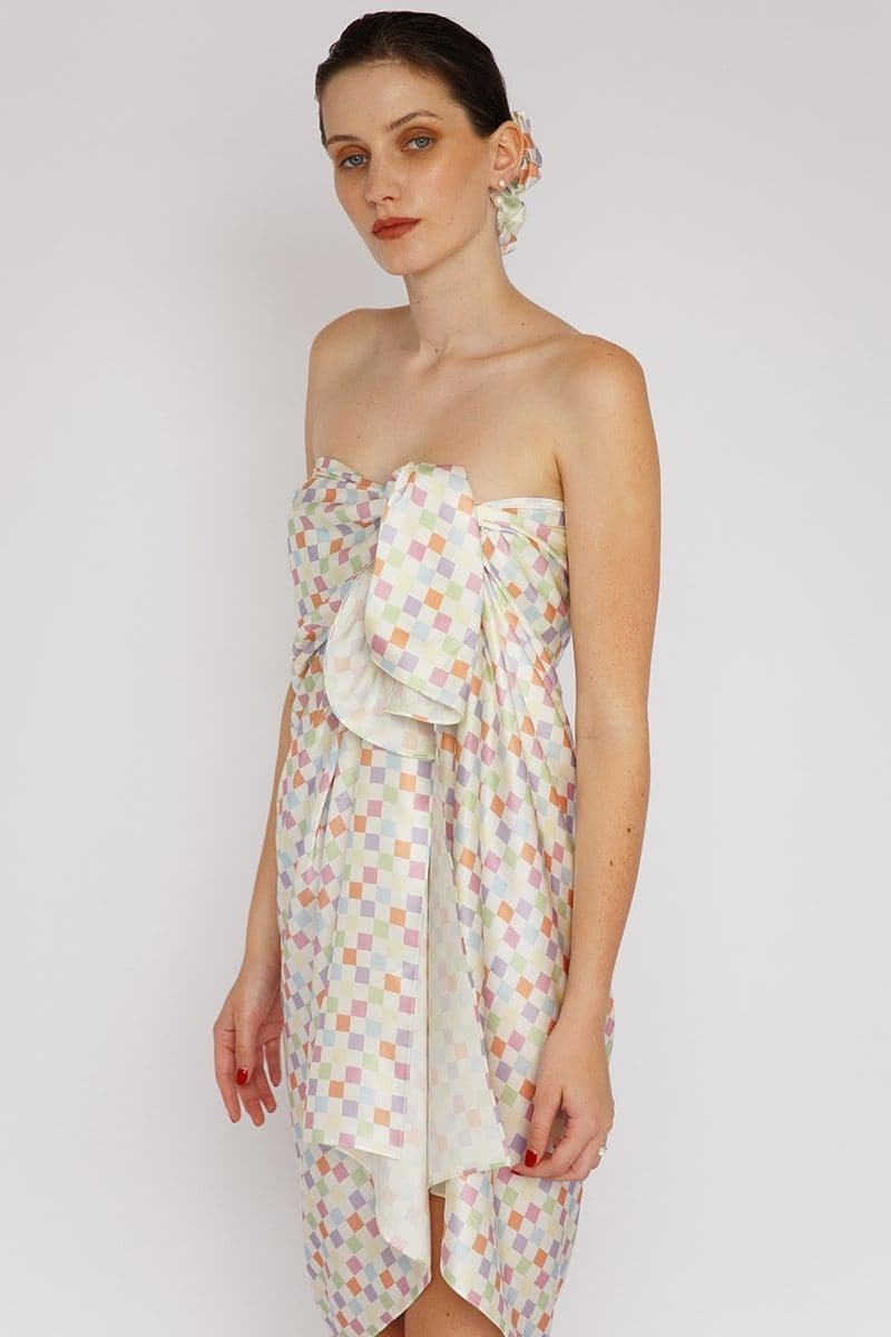 Aethera checked Charlotte silk square scarf and Isla silk front tie pareo set in multicolor, styled as hair accessories.