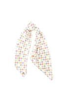 Aethera checked Charlotte silk square scarf and Isla silk front tie pareo set in multicolor, styled as hair accessories.