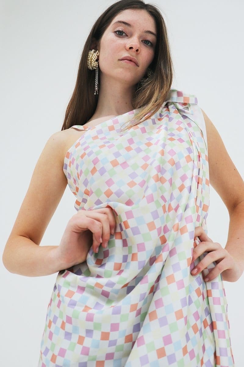 Aethera checked Charlotte silk square scarf and Isla silk front tie pareo set in multicolor, displayed as stylish hair accessories.