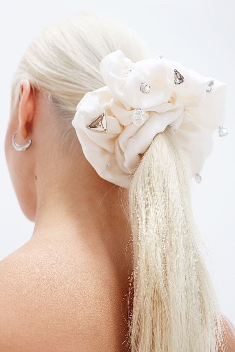 Aethera Fionnuala comb and Harlow oversized silk scrunchie set in Jade Pearl, featuring a decorative hair comb and large silk hair accessory.
