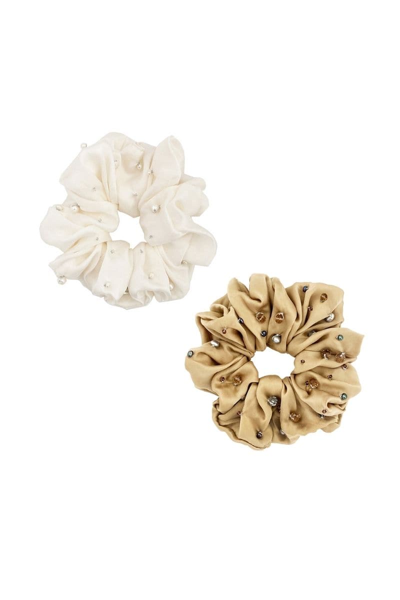 Aethera Francoise embellished silk scrunchie set with bronze and pearl accents, featuring luxurious hair accessories on a neutral background.