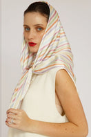 Aethera stripe Charlotte silk square scarf and Isla silk front tie pareo set in multicolor, styled as elegant hair accessories.