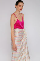 Aethera stripe Charlotte silk square scarf and Isla silk front tie pareo set in multicolor, styled as hair accessories or fashionable wrap.