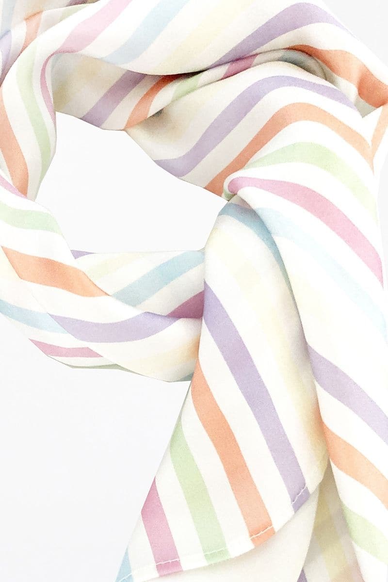 Multicolor silk square scarf and front-tie pareo set by Aethera, featuring stripe Charlotte design and Isla silk accents.