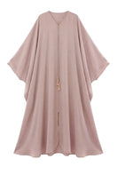 Shatha Essa tassel detail embellished caftan, a stylish maxi dress with intricate tassel accents and embroidery on flowing fabric.