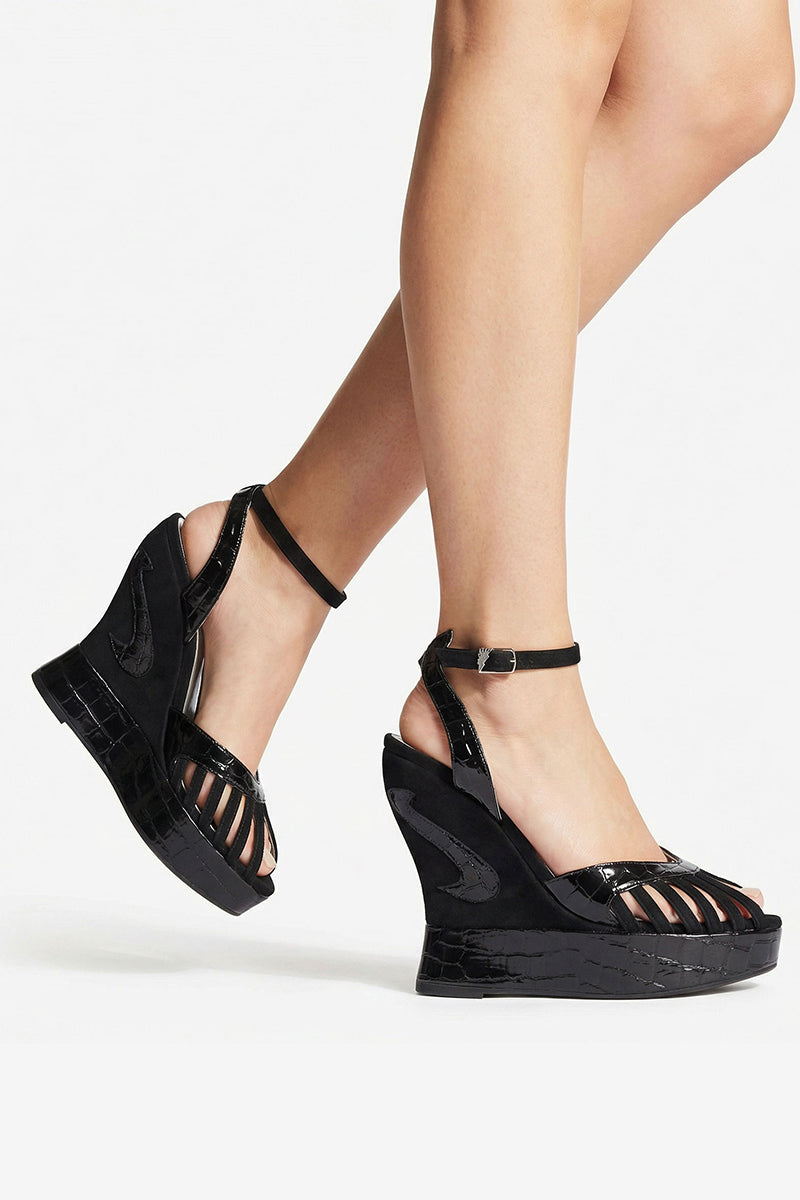 Black Margaux mid heels by Terry de Havilland, showcasing sleek design and elegant heel height.
