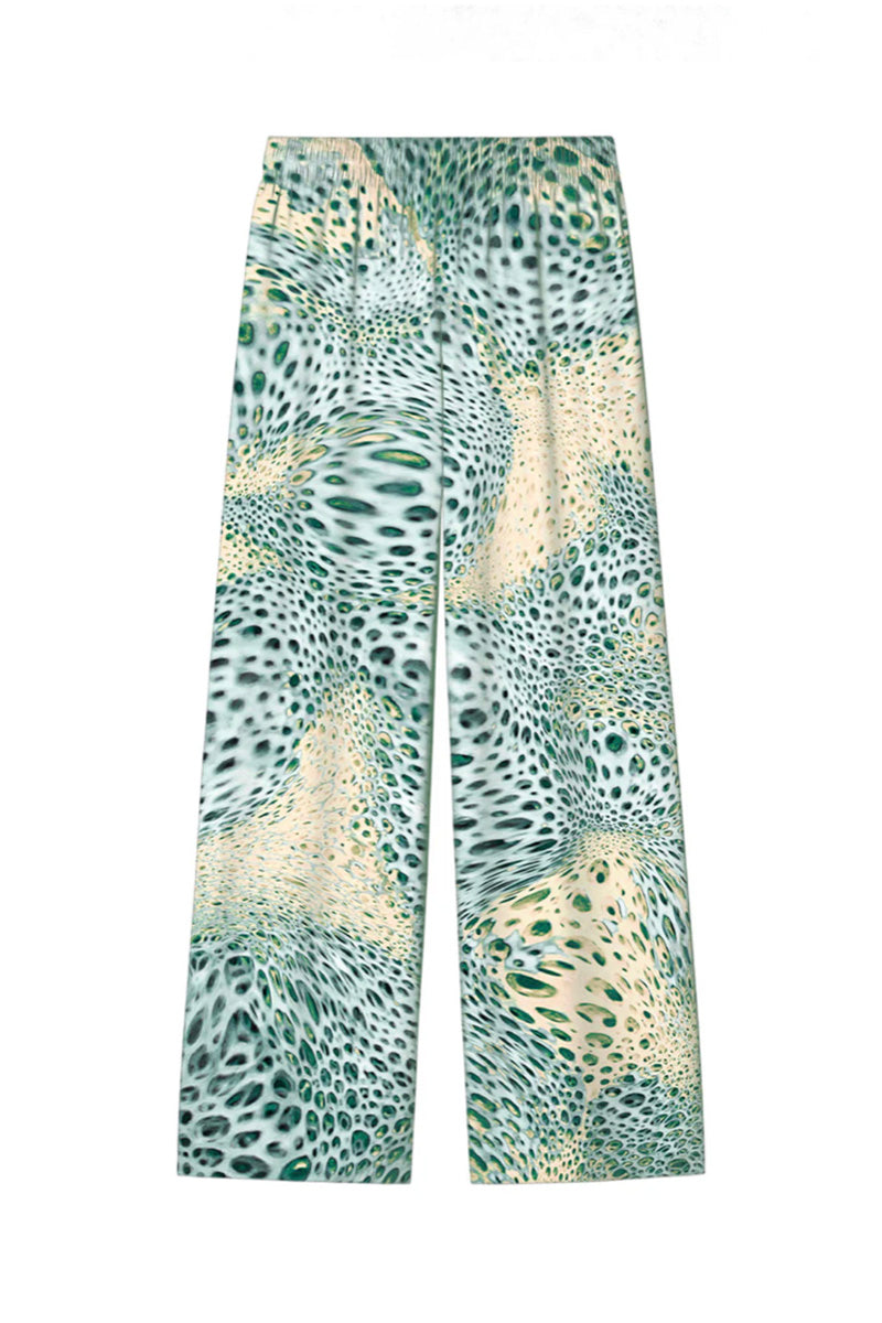 Creamy Moussard silk pants by Amel Batita featuring a relaxed fit and elegant drape.