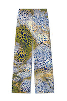 Amel Batita GIO MOUSSARD silk pants featuring a relaxed fit and elegant design, shown in a stylish, natural pose.