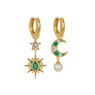 Gold and green Luna earrings by Amelia Scott featuring gold hoops and emerald-green accents for a stylish look.
