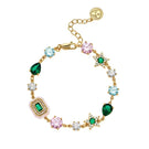 Gold Celeste bracelet by Amelia Scott featuring emerald green accents, stylish and elegant jewelry accessory.