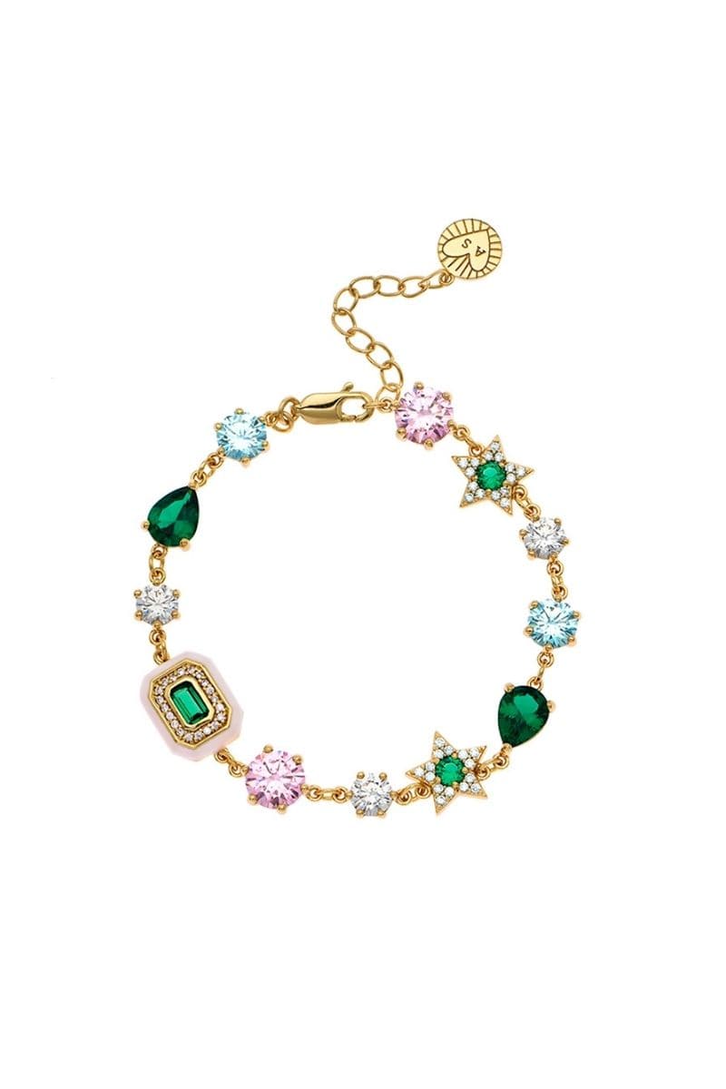Gold Celeste bracelet by Amelia Scott featuring emerald green accents on a delicate gold bracelet.