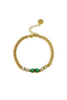 Gold Sofia bracelet by Amelia Scott featuring emerald green accents, elegant jewelry accessory with a sleek design.