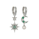 Silver Luna earrings by Amelia Scott featuring emerald green accents and a sleek, modern design.