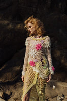 Multicolor handmade crochet top by Andreeva featuring intricate patterns and a fitted design, perfect for casual or boho styles.