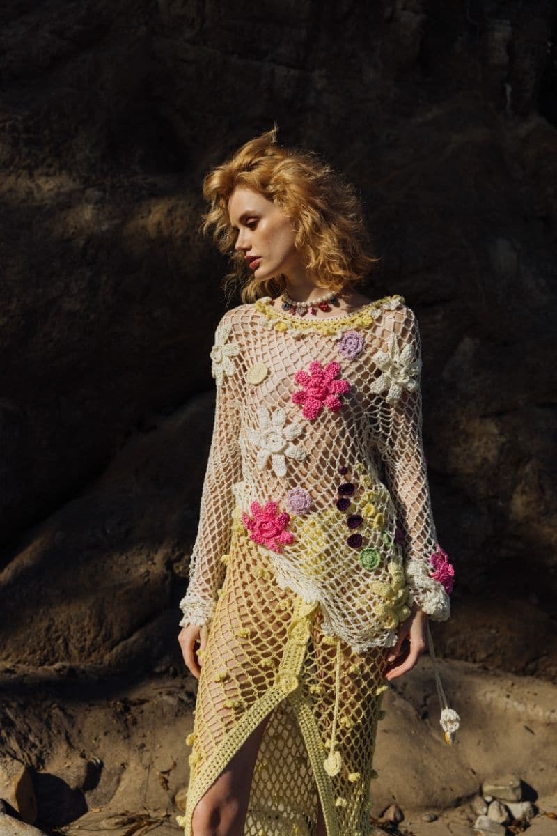 Multicolor handmade crochet top by Andreeva featuring intricate patterns and a fitted design, perfect for casual or boho styles.